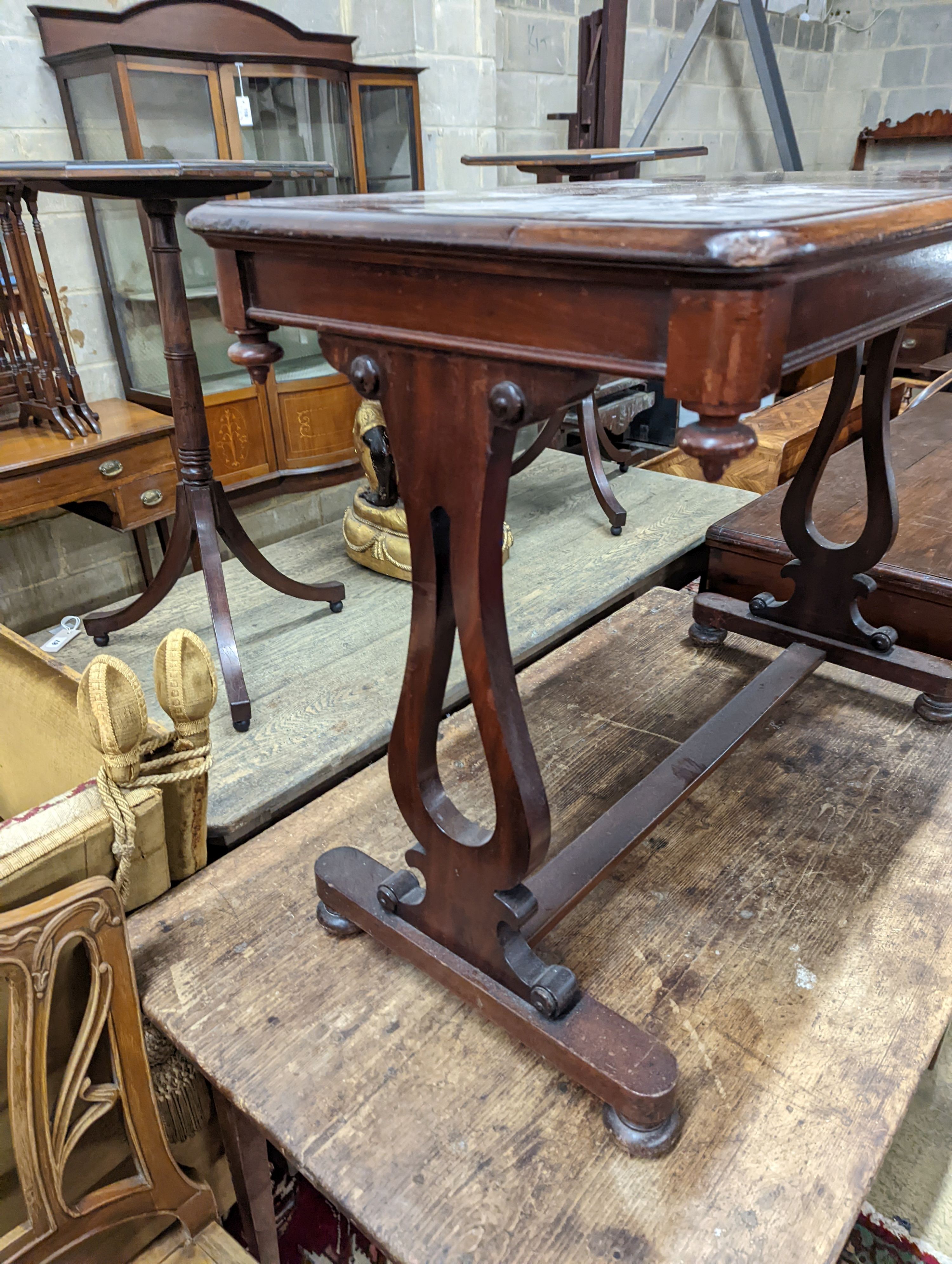 A Victorian mahogany stretcher centre table. W-92cm, D-49cm, H-72cm.